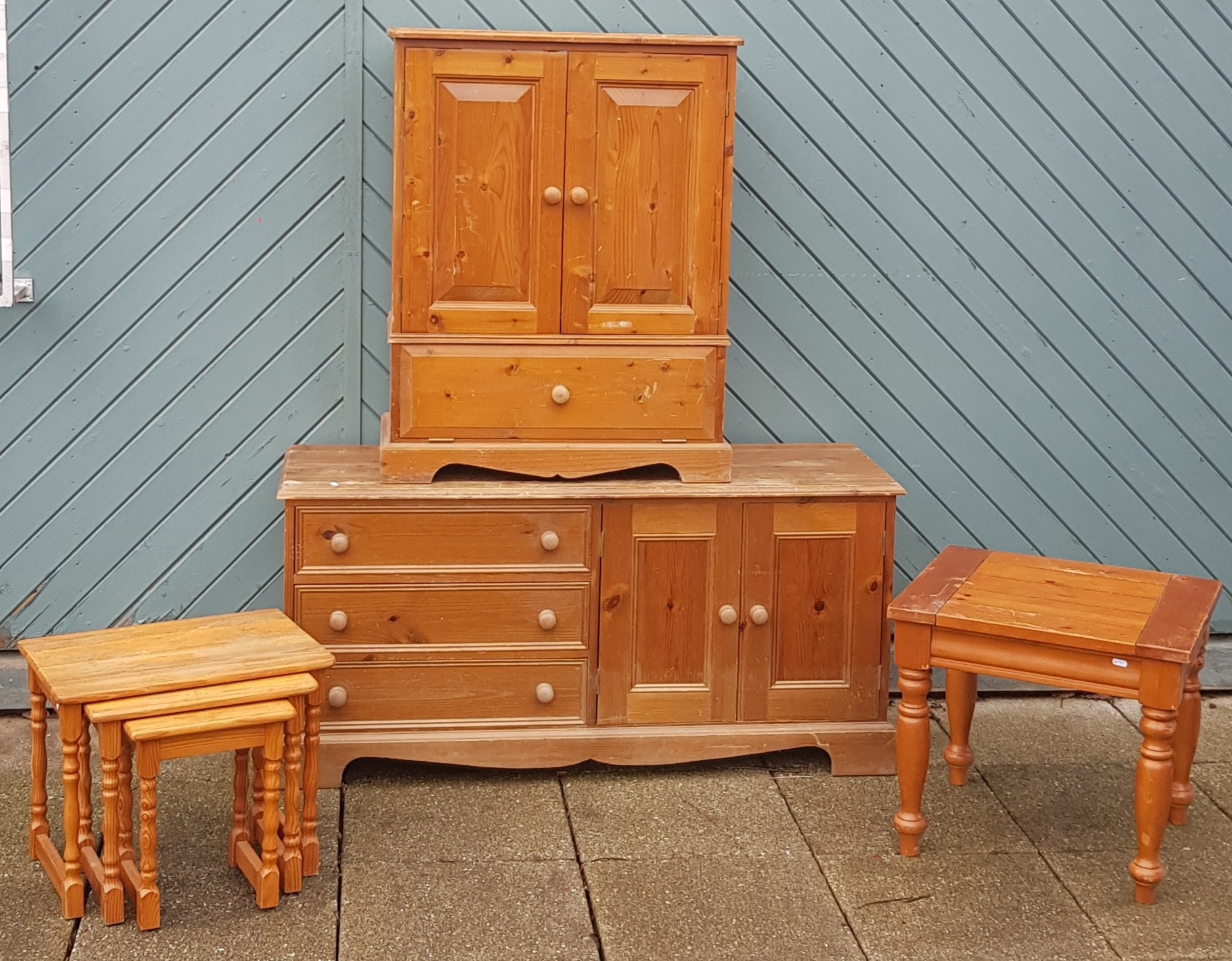 A pine sideboard, W130, H63, D45cm, together with a pine Hi-Fi cabinet, a nest of tables and a