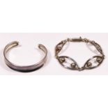 A Mexican silver openwork panel link bracelet and a silver bangle, 51gm