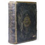 A Brown's Victorian bible, brass and leather bound having the old and new testaments, with