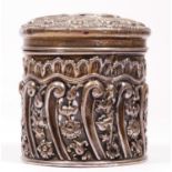 An Edwardian silver glass jar with embossed and pierced frame, Chester 1902, height 7cm