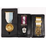 Three silver and silver gilt Masonic jewels, including a Charity Jewel for Royal Arch, cases, 66gm