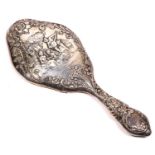 An Edwardian silver hand mirror, Birmingham 1903, with embossed decoration, 28cm