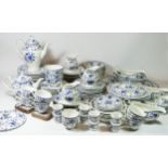 A comprehensive ironstone dinner service by Johnson Bros, blue & white floral decoration 'Indies'