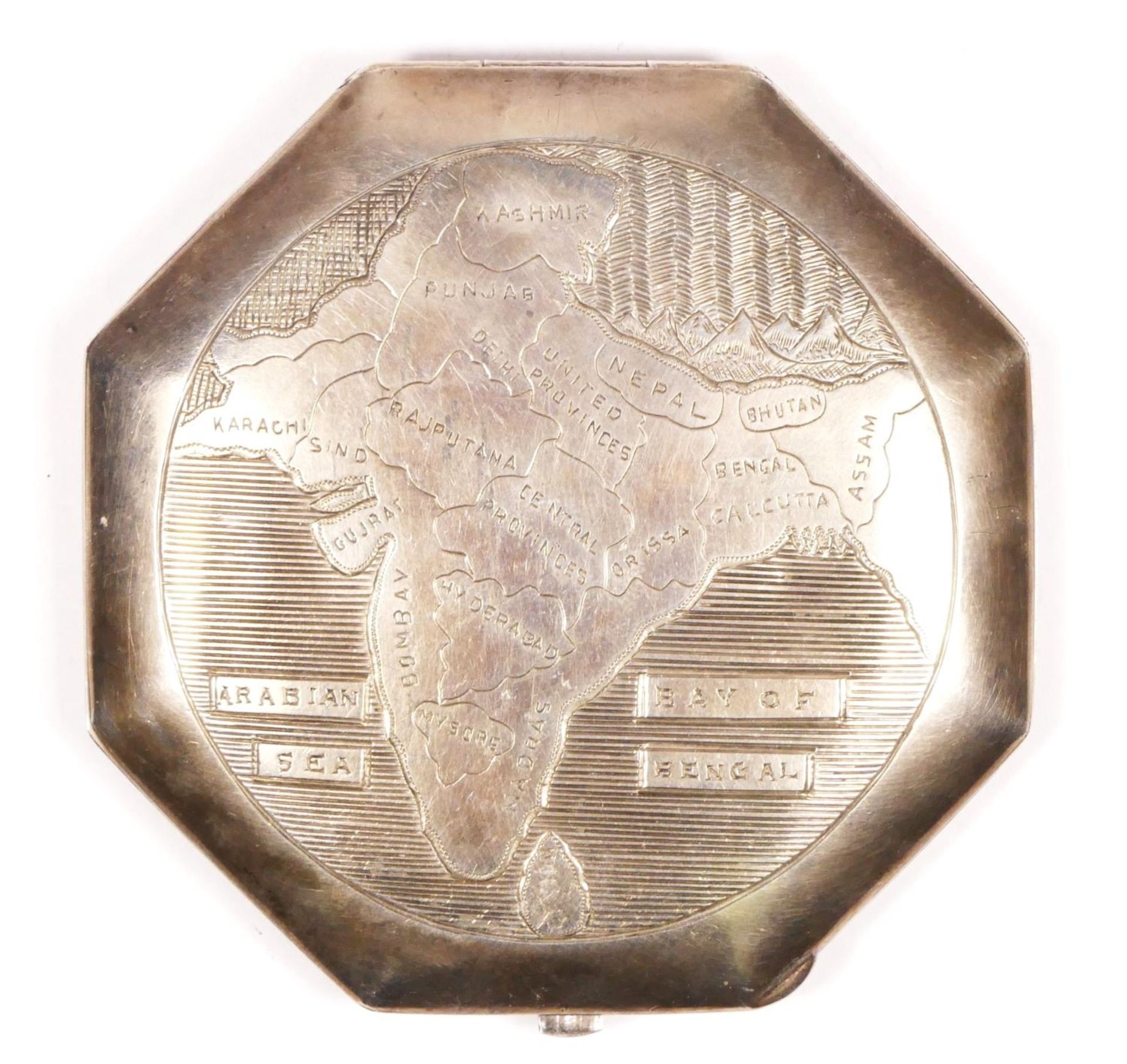 A Sterling Silver octagonal compact, with engraved map of India, 7.5cm, 91 gm including mirror