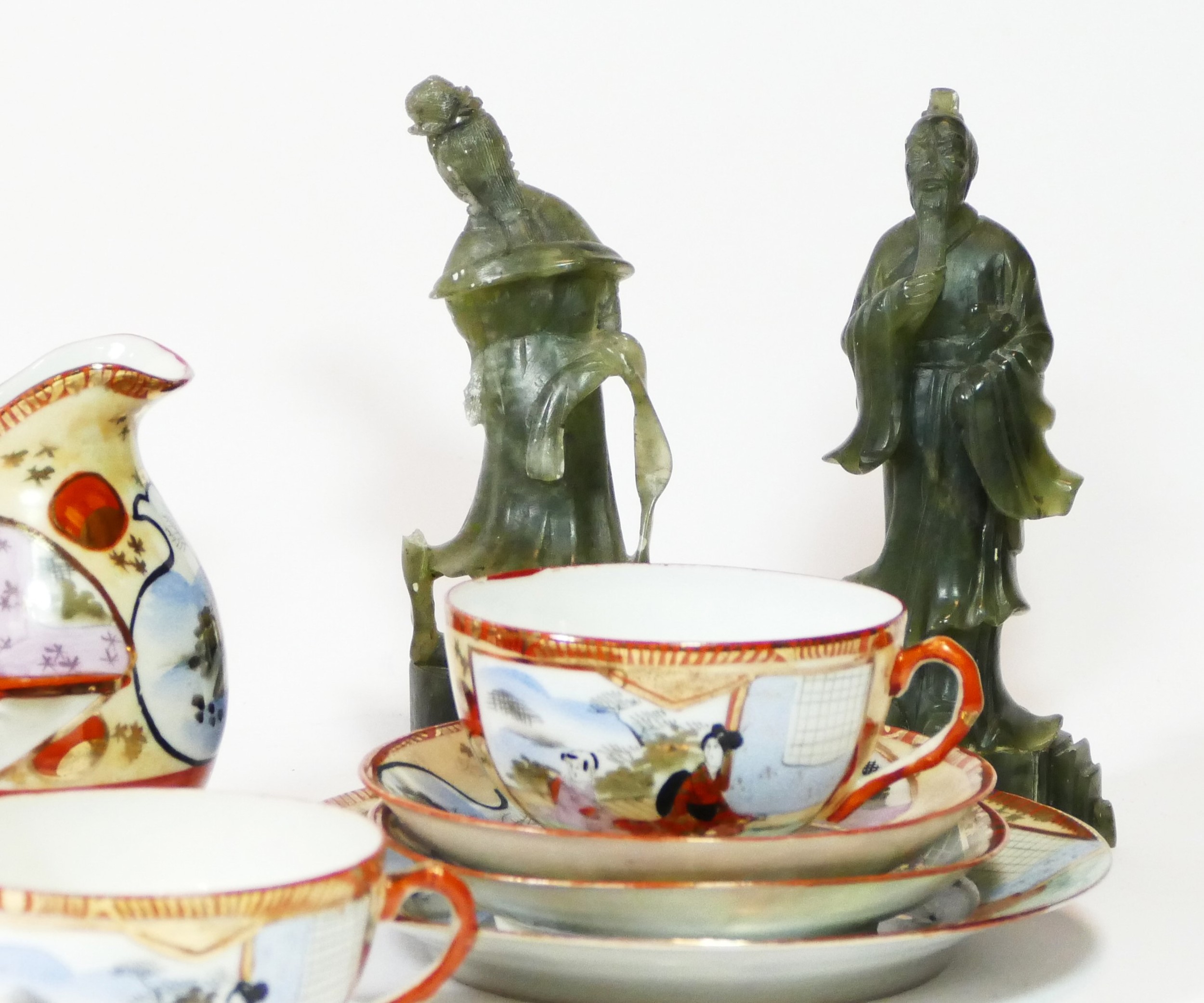 A pair of jade figurines, 18cm tall, together with a Japanese porcelain tea service and four ceramic - Image 2 of 3