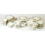 A Royal Doulton twenty four piece part dinner service 'Larchmont' pattern, model TC1019, together