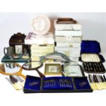 A collection of boxed collector plates, together with cased cutlery, vanity mirrors, a stationery