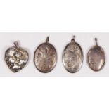 Four silver photograph lockets, the heart shape embossed example35 x 32mm, 50gm