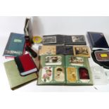 A collection of over 250 Victorian and Edwardian postcards in albums.