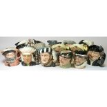 A collection of eighteen toby jugs, Royal Doulton, to include Lobster Man, Robin Hood, Merlin,