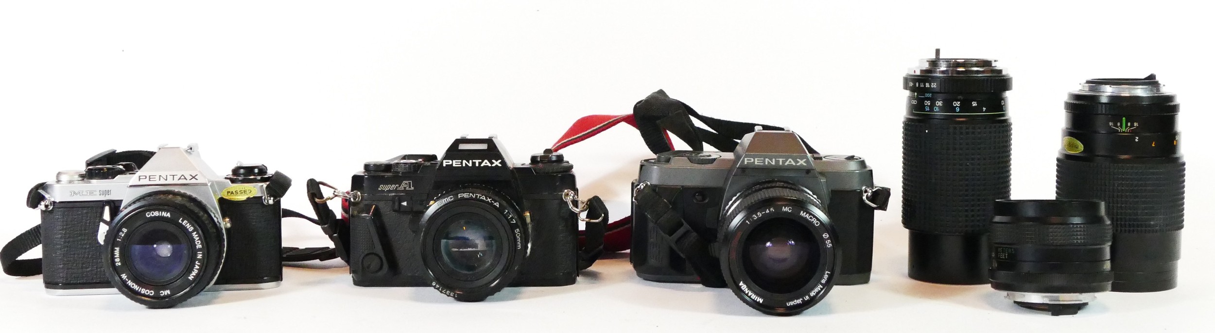 Three Pentax cameras, to include a P306, a Super A and a ME Super, with lens, together with three