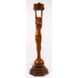 An Art Deco style figural table lamp, cold painted spelter, depicting an outstretched flapper girl