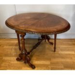 A 19th century walnut Sutherland table, profusely inlaid throughout with turned and intricate carved