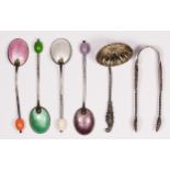 A silver and enamel set of four coffee bean spoons, Birmingham 1938, a silver sugar sifter spoon and