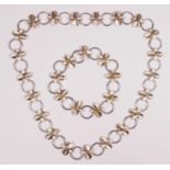 A silver floral panel link necklace, 42cm and a matching bracelet 17.5cm, 58gm