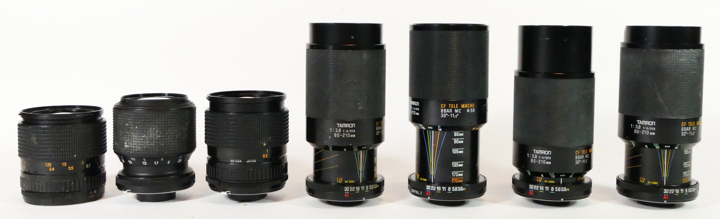 Seven Tamron lenses, to include a 28mm-70mm (x2), a 80mm-120mm (x4) and a 70mm-210mm