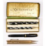 A Queensway Twin Set of biro and propelling pencil, mottled black and white body, case, a Conway