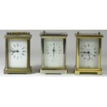 A Garrard & Co, London carriage clock, brass case with four glazed sides, white dial painted with