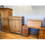 A stripped pine tallboy, comprising of single frieze drawer over twin cupboards. H136, W105,