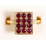 A vintage 9ct rose gold and garnet panel ring, London 1972, U, 4.3gm