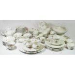 A Royal Doulton dinner service 'Tumbling Leaves' pattern TC 1004, comprising of over fifty pieces,