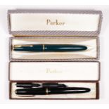 A Parker Maxima Duofold black fountain pen, with 14 ct gold 50 nib, two other metal nibs, case and a