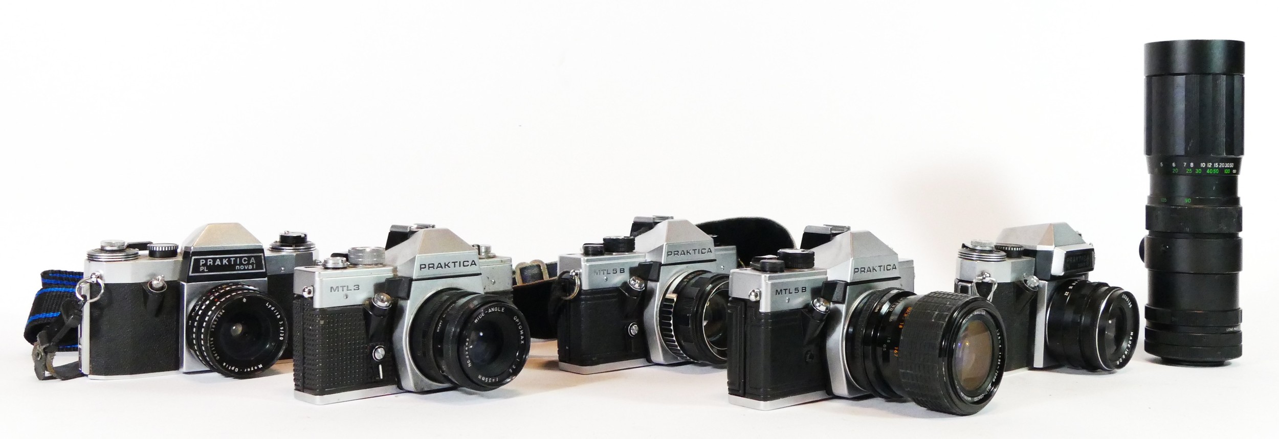 Five Praktica film cameras, to include a MTL 5B (x2), a MTL 3, a PL Nova 1 and a PL Nova 1b, with - Image 2 of 2