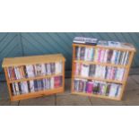 A collection of DVD's, primarily films, over 200 titles, with display shelf units. (2)