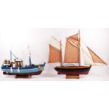 A model of a 19th century fishing vessel 'Smack', having ketch rig with contrasting Breton red and