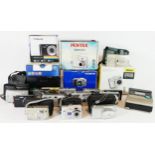 A collection of digital cameras and accessoiroes, to include a Polaroid IS426, a Fujifilm S8000FD, a