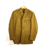 A pair of Second World War Australian Battle dress trousers, signed 452 on internal waistband,