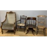 A harlequin set of four early 20th century chairs, to include a carved mahogany library bergere