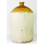 A large stoneware jug, signed 1920 S.J.Chadwick Wine And Spirit Merchant, Ilkeston, 42cm tall