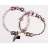 Pandora, two silver charm bracelets, 64gm