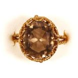 A 9ct gold and smokey quartz dress ring, with rope twist decoration, J, 3.4gm