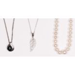 A Mikimoto graduated cultured pearl necklace the largest bead 7mm, 46cm, silver clasp and two silver