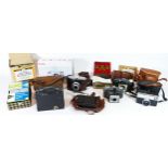 A collection of vintage cameras and equipment, to include a Kodak box Brownie, a Victor Coronet, a
