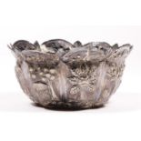 An Indian silver sugar bowl with embossed and chased decoration, diameter 9cm, 50gm