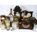 A collection of mantel clocks, wall clocks and barometers, circa 1950s-80s, having manual wind and