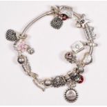 Pandora, a silver charm bracelet 64gm