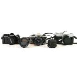 Three film cameras, to include a Yashica FX3 super 2000, a Yashica FX-D and a Mamiya 1000TL, with