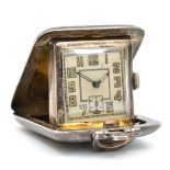 An Art Deco silver purse/travel watch, Birmingham 1935, silvered dial, subsidiary seconds dial,