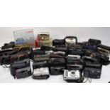 A collection of thirty five 35mm cameras, mostly Olympus and Canon, to include a Canon XL, boxed,