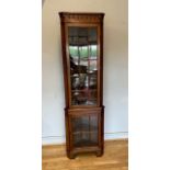 A mahogany glazed freestanding corner cabinet. H203, W58cm.