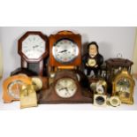 A collection of clocks, to include a cold cast metal figure in the form of a gentleman with a