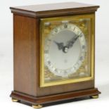 A mid 20th century Elliott 8 day mantel clock, mahogany case with silvered dial, brass bezel and