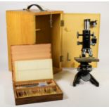 A laboratory spec microscope by Watson, in fitted case together with a selection of microscope