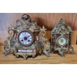 A Louis XV style mantel clock, having gilt metal Rococo scroll design with painted dial and