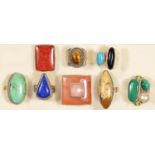 Eight silver and gemset rings, various sizes, 106gm.