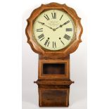 A late 19th century drop dial wall clock, having inlaid walnut veneer case, with enameled dial and